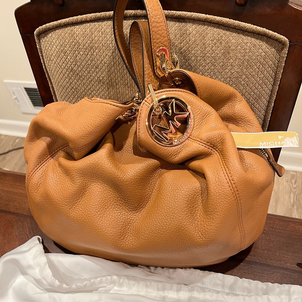 Large, tan leather MK purse-New, never used